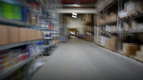 Walking frame from inside a dark warehouse. Slow Shutter Speed Effect Vidéo 257017622