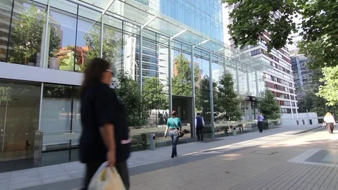 Walking in front of building Stock Footage 77045469
