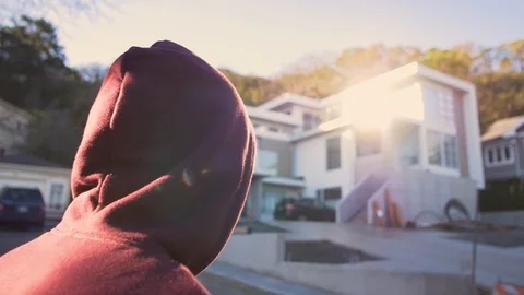 Walking in front of mansion Stock Footage 100525934