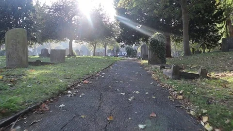 Walking up in a graveyard in London Stock Footage 96503777