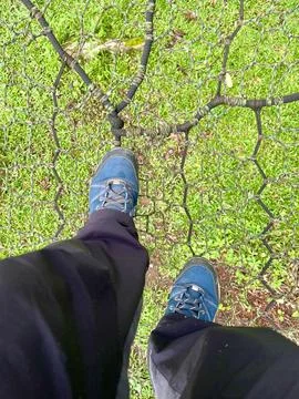 Walking on Green Safety Net Stock Photos