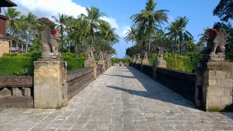 Walking the grounds of Intercontinental Bali Resort in Jambaran Bay Stock Footage 95419717
