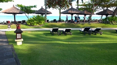 Walking the grounds of Intercontinental Bali Resort in Jambaran Bay Stock Footage 95419748