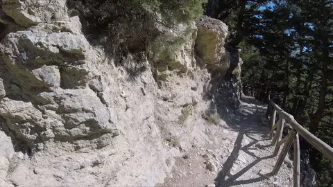 Walking hiking with GoPro Camera on a Mountain rocky Path on island of Crete  Stock Footage 86451145