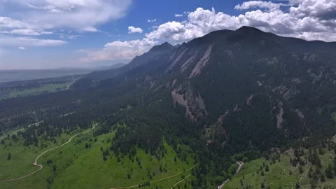 Walking hiking trail spring summer morning blue sky clouds Flatirons Chautauqua Stock Footage 316391289
