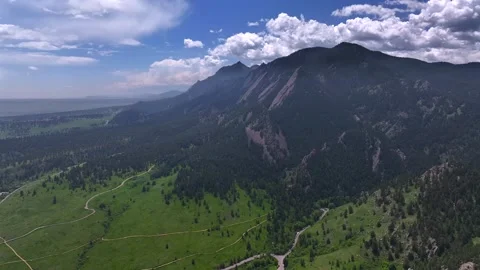Walking hiking trail spring summer morning blue sky clouds Flatirons Chautauqua Stock Footage 316391453