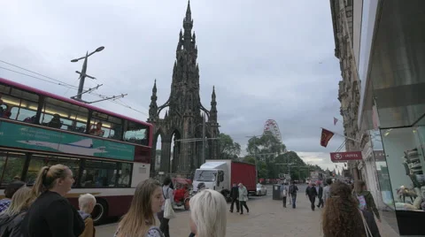 Walking by H&amp;M store and Old Waverley Hotel on Princes street, Edinburgh Video stock 61560508