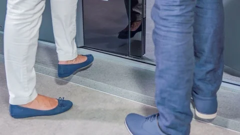 Walking into the house and closing both front doors Stock Footage 83913311