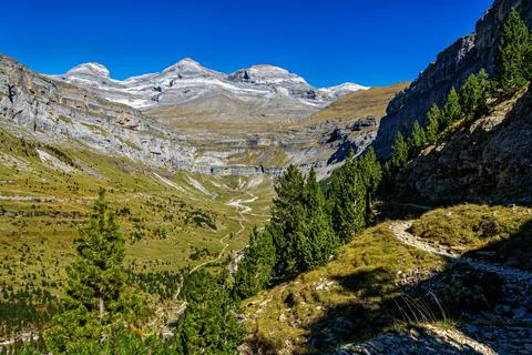 Walking on the Hunter's Trail, Senda de los Cazadores in autumn. Ordesa and M Stock Photos