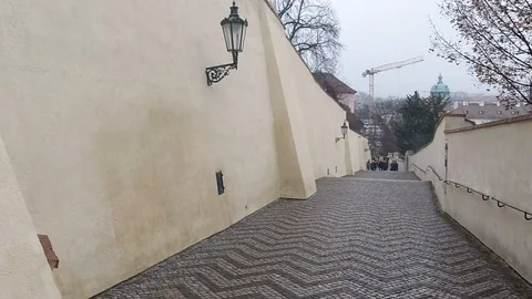 Walking hyperlapse from Prague Castle ending in John Lennon Wall, city of Prague Stock Footage 126260990