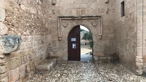 Walking inside Ayia Napa Monastery from the back Entrance Stock Footage 90820099