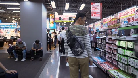 Walking inside Busy Japanese Electronics Store Stock Footage 105014184