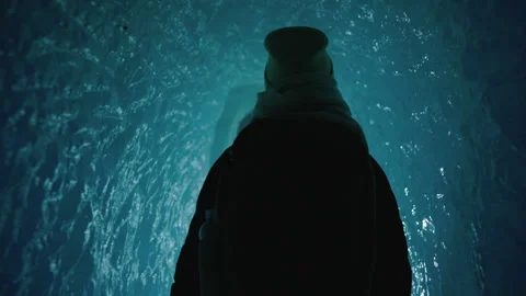 Walking Inside a Glacier: Girl Exploring Jungfraujoch’s Ice Wonderland Stock Footage 287381824