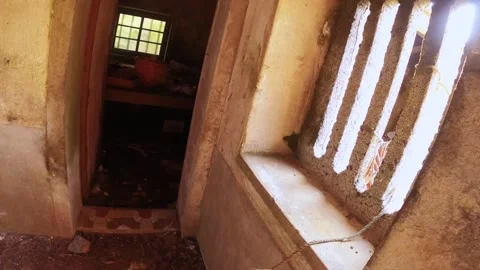 Walking inside interior of an abandoned building structure house in traditional  Stock Footage 242327610