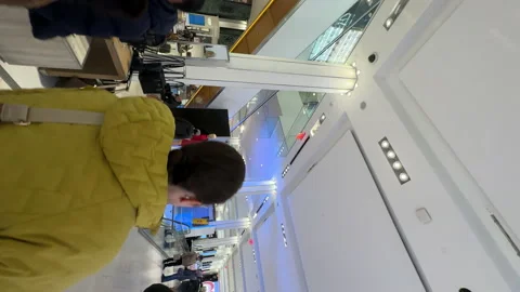 Walking inside Macy's store department. View of shoppers and fashion stores.NYC Stock Footage 233353018