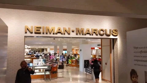 Walking up to inside mall entrance to Northpark Neiman-Marcus Department Store Stock Footage