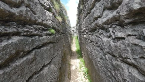 Walking Inside a Narrow Rock Canyon Maze, Limestone Formations Stock Footage 337881412