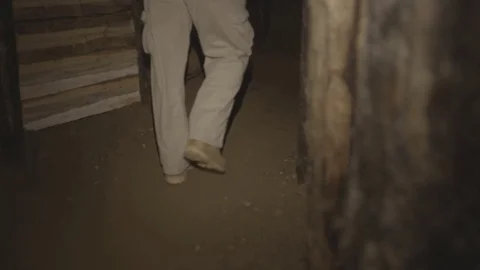 Walking inside old mine tunnel Stock Footage 72345288