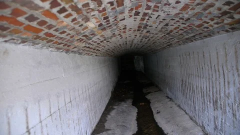 Walking Inside Underground Storm Water System Tunnel 스톡 동영상 107416143