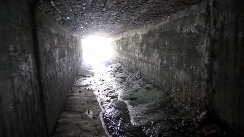 Walking Inside Underground Storm Water System Tunnel Stock Footage 107416253
