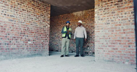 Walking, inspection or men with checklist at building site, renovation progress Stock Footage 336802487
