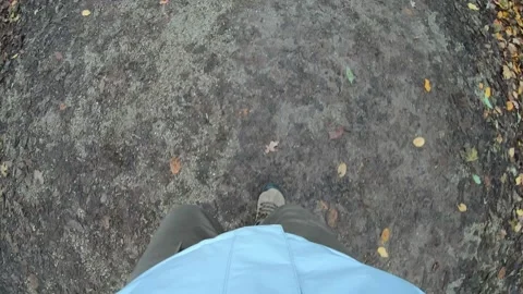 Walking on a Leafy Trail in Autumn Stock Footage 327973823