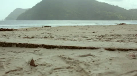 Walking on ledge on beach 스톡 동영상 55692927