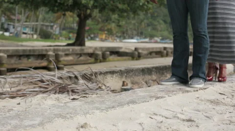 Walking on ledge on beach profile 02 스톡 동영상 55692720