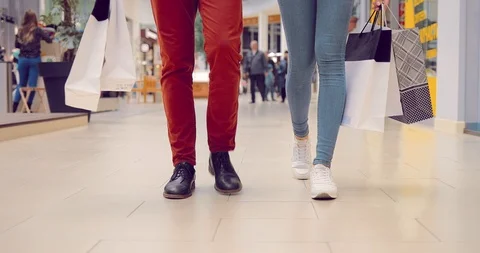 Walking legs of a couple in a mall Stock-Footage 95933198
