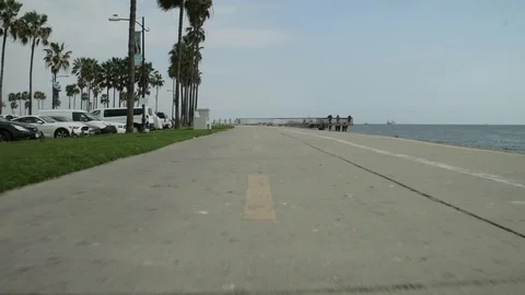 Walking in a line in a Long Beach 스톡 동영상 100156787