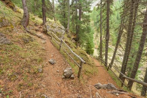 Walking long a peaceful mountain path in Valle di Funes into the Italian Dolo Stock Photos