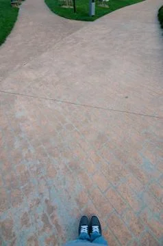 Walking on a merging path Stock Photos