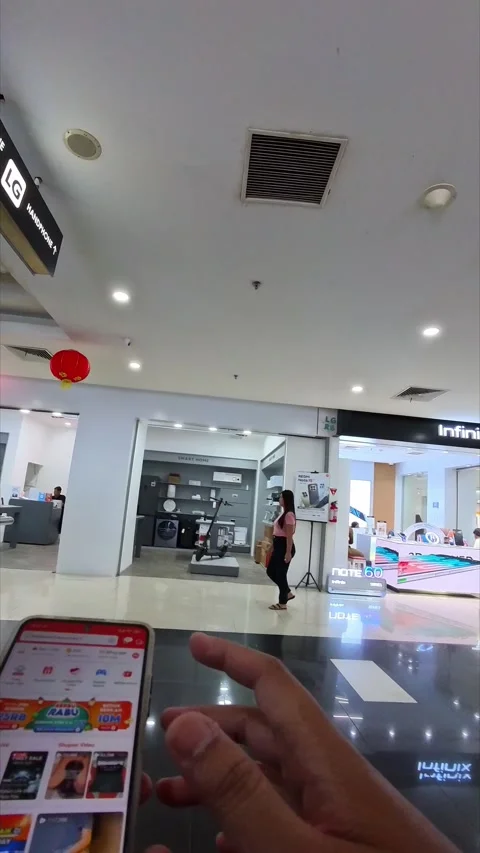 Walking in a mobile electronics store Stock Footage 333426794