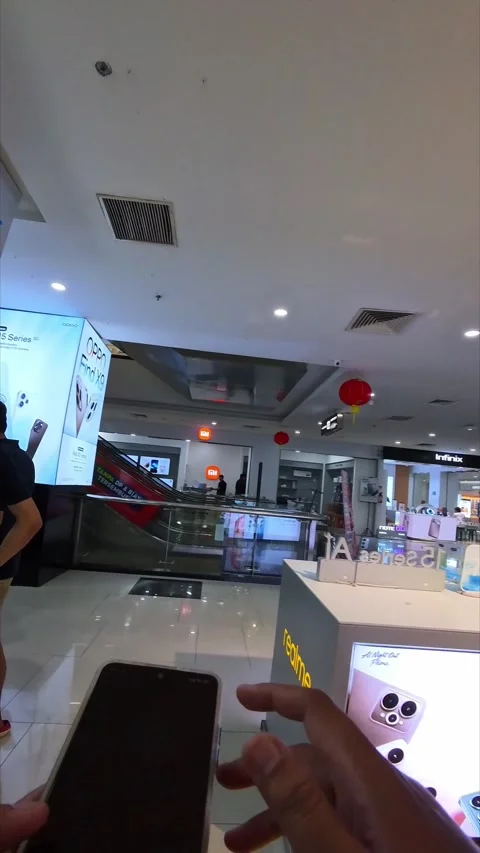 Walking in a mobile electronics store Stock Footage 333426797