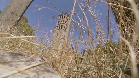 Walking to the mountain and finding a tower Stock Footage 104160747