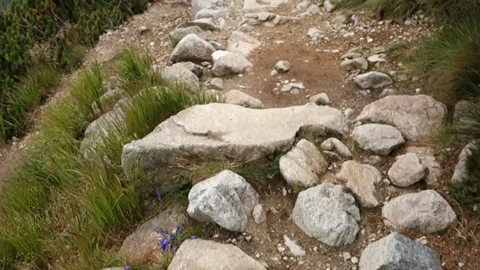 Walking on a mountain stone walkway Video stock 115486158