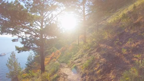 Walking in the mountain on the sunset background. Slow motion Stock Footage 124264064