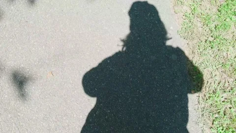 Walking on my shadow Stock Footage 131774471