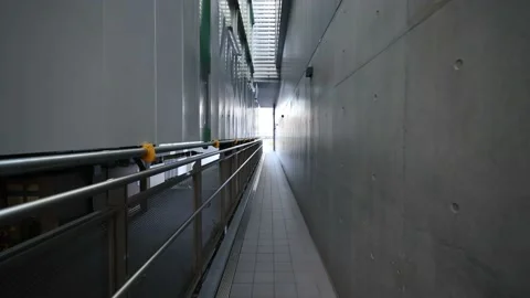 Walking the narrow path between buildings. Tokyo Japan. Stock Footage 220094376