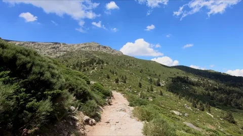 Walking a narrow path towards the Laguna Grande Stock Footage 271023612