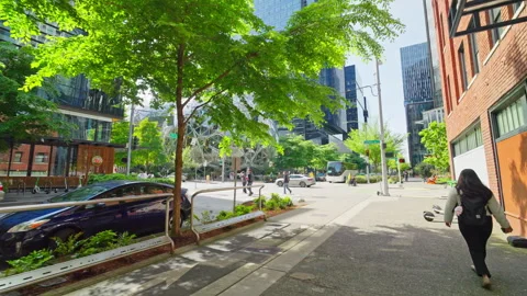 Walking near Amazon headquarters in downtown Seattle’s South Lake Union. Modern Stock Footage 328356949