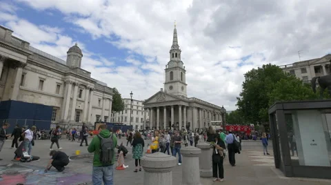 Walking near St Martin-in-the-Fields Church in London Stock Footage 61293283