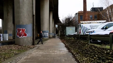 Walking next to a large highway bridge Video stock 171799249