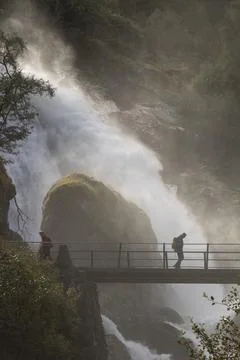 Walking next to the waterfall Stock Photos