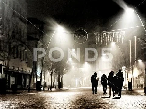 Walking by night Stock Photos