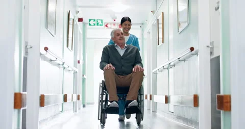 Walking, nurse and old man in wheelchair at hospital for appointment, checkup Stock Footage 340901217