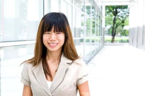 Walking by office building. Stock Photos