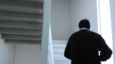Walking up office stairwell Video stock 77052350