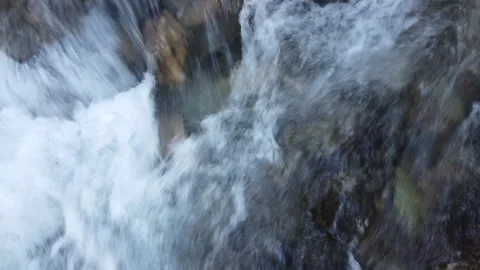 Walking or flying close over strong water current Stock Footage 250458502