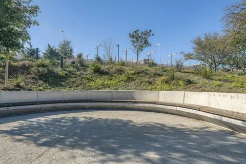 Walking or skating trail with built in seats at Waterloo Park In Austin Texas Stock Photos